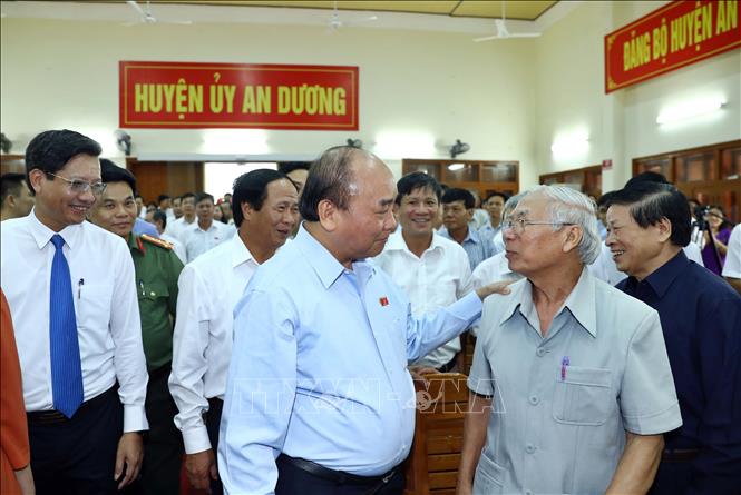 Trong ảnh: Thủ tướng Nguyễn Xuân Phúc và các đại biểu. Ảnh: Thống Nhất -TTXVN  