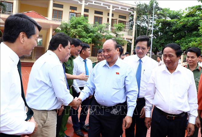 Trong ảnh: Thủ tướng Nguyễn Xuân Phúc và các đại biểu. Ảnh: Thống Nhất -TTXVN  