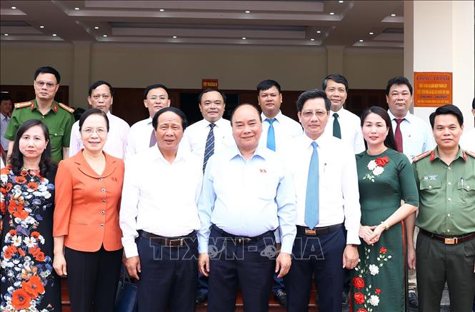 Trong ảnh: Thủ tướng Nguyễn Xuân Phúc và các đại biểu. Ảnh: Thống Nhất -TTXVN  
