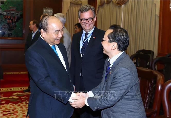 Trong ảnh: Thủ tướng Nguyễn Xuân Phúc với các đại biểu dự hội nghị. Ảnh: Thống Nhất -TTXVN  