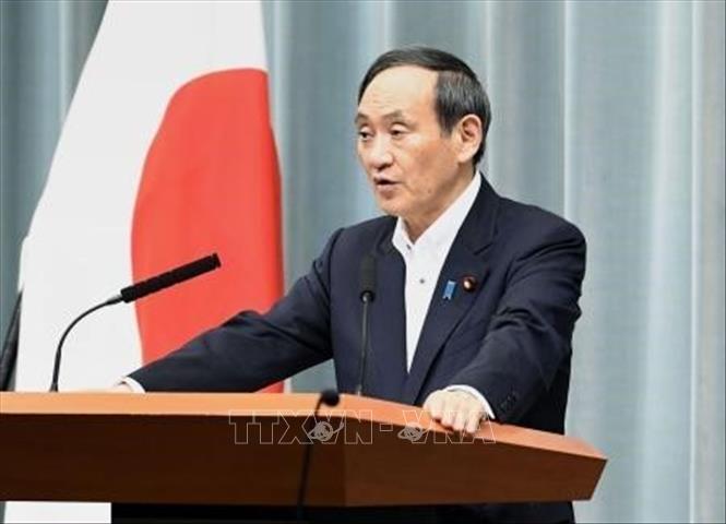 Trong ảnh: Chánh Văn phòng nội các Nhật Bàn Yoshihide Suga trong cuộc họp báo tại Tokyo ngày 18/6/2019. Ảnh: Kyodo/ TTXVN