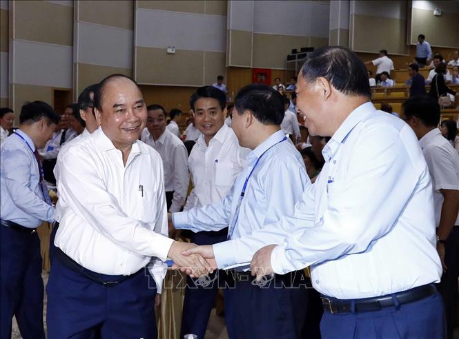 Trong ảnh: Thủ tướng Nguyễn Xuân Phúc với các đại biểu dự hội nghị. Ảnh: Thống Nhất- TTXVN