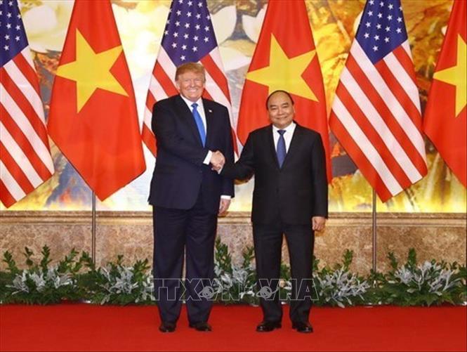 Trong ảnh: Thủ tướng Nguyễn Xuân Phúc hội kiến Tổng thống Hoa Kỳ Donald Trump nhân dịp sang Việt Nam dự Hội nghị thượng đỉnh Hoa Kỳ - Triều Tiên lần thứ hai, sáng 27/2/2019 tại Hà Nội. Ảnh: Thống Nhất – TTXVN