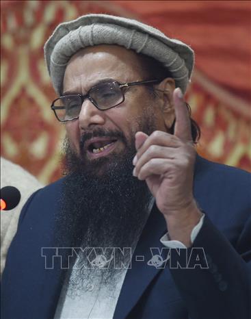 Trong ảnh (tư liệu): Thủ lĩnh của nhóm phiến quân Lashkar-e-Taiba (LeT) Hafiz Saeed phát biểu tại cuộc họp báo ở Lahore, Pakistan ngày 23/1/2018. Ảnh: AFP/TTXVN