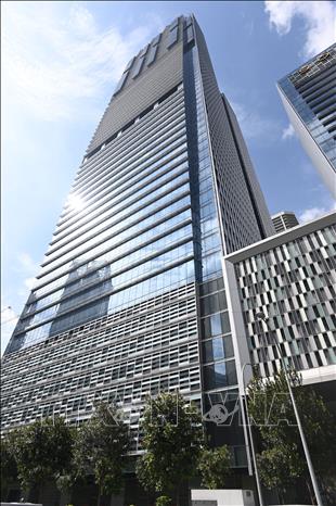 Trong ảnh: Tòa tháp Wallich Residence (phải) nơi có căn hộ penthouse đắt giá nhất Singapore . Ảnh: AFP/TTXVN