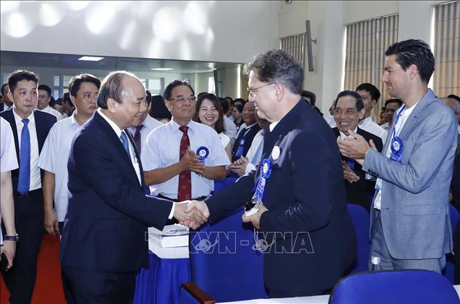 Trong ảnh: Thủ tướng Nguyễn Xuân Phúc với các đại biểu dự Lễ kỷ niệm. Ảnh: Thống Nhất-TTXVN