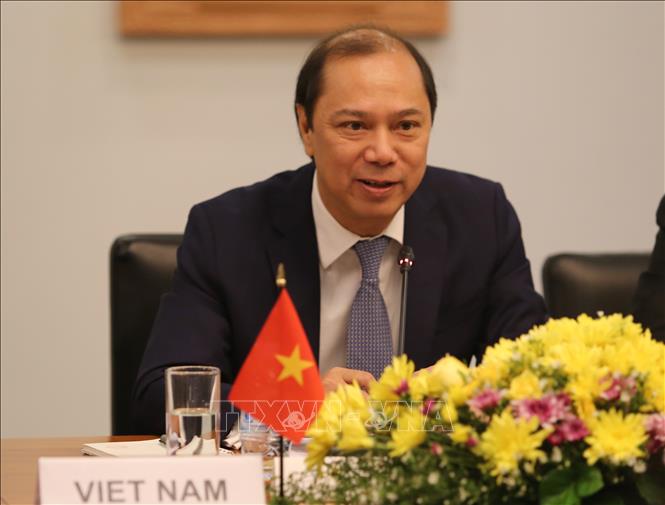 Thứ trưởng Bộ Ngoại giao Nguyễn Quốc Dũng, Trưởng đoàn Việt Nam phát biểu tại hội nghị. Ảnh: Minh Hưng-P/v CQTT TTXVN tại Campuchia. 
