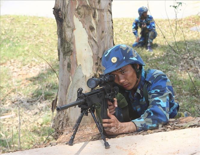 Trong ảnh: Chiến sĩ Lữ đoàn Hải quân đánh bộ 147 huấn luyện phản công đánh chiếm mục tiêu. Ảnh: Trọng Đức - TTXVN