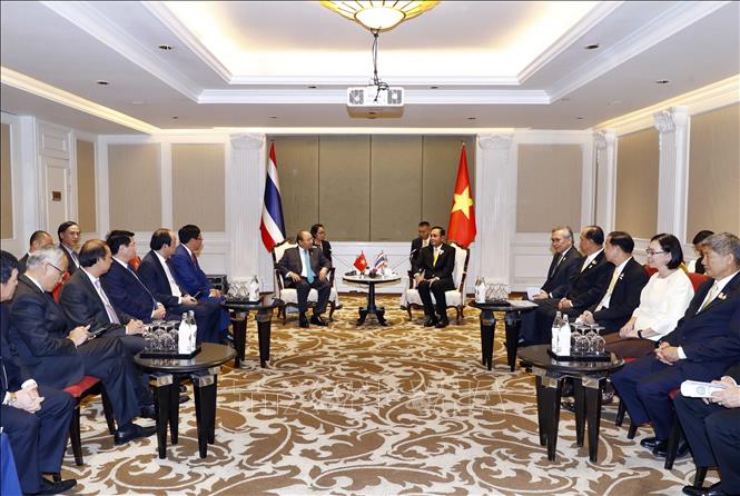 Trong ảnh: Trong chương trình tham dự Hội nghị Cấp cao ASEAN lần thứ 34 tại Thái Lan, chiều 22/6/2019, tại Thủ đô Bangkok, Thủ tướng Nguyễn Xuân Phúc hội kiến Thủ tướng Thái Lan Prayuth Chan-o-cha. Ảnh: Thống Nhất - TTXVN