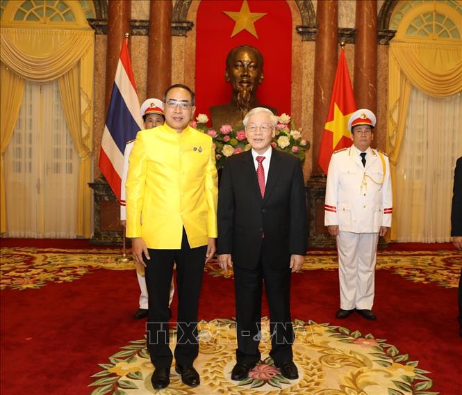 Trong ảnh: Tổng Bí thư, Chủ tịch nước Nguyễn Phú Trọng với Đại sứ Đặc mệnh toàn quyền Vương quốc Thái Lan tại Việt Nam Tanee Sangrat tại lễ trình Quốc thư. Ảnh: Trí Dũng – TTXVN