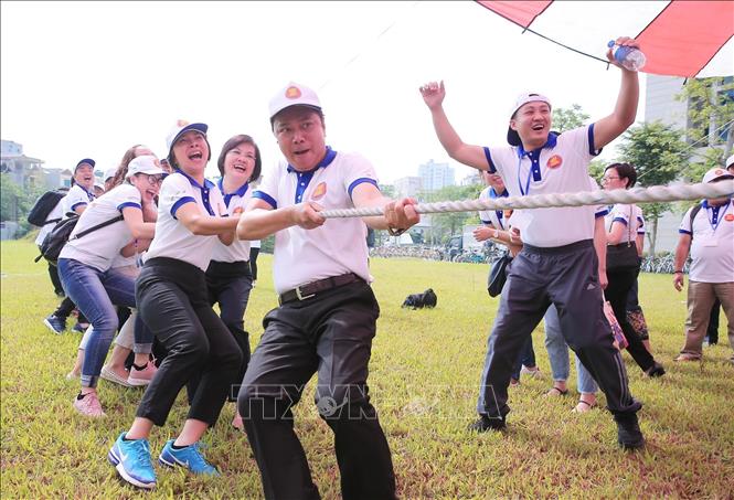 Photo: Participants take part in sports and musical exchanges, folk games, and a food festival at the event. VNA Photo: Lâm Khánh 