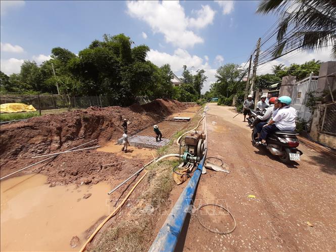 Đầu tư 150 tỷ đồng cải tạo suối Đồng Tiền và suối Tầm Vông và hành lang hai bên suối ở TP. Đồng Xoài - Bình Phước.  Ảnh: Dương Chí Tưởng-TTXVN