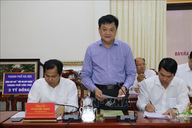 Trong ảnh: Ông Dương Tấn Hiển, Phó Chủ tịch UBND thành phố Cần Thơ báo cáo kết quả hợp tác giữa 2 thành phố. Ảnh: Ngọc Thiện- TTXVN.
