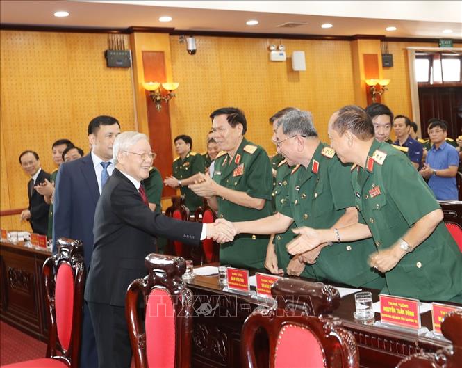 Trong ảnh:Tổng Bí thư, Chủ tịch nước Nguyễn Phú Trọng, Bí thư Quân ủy Trung ương với các đại biểu dự buổi lễ. Ảnh: Trí Dũng – TTXVN