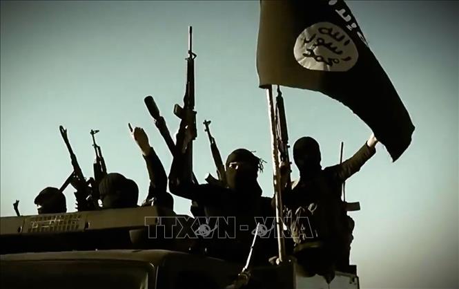 Trong ảnh: (tư liệu) Các tay súng IS tại một địa điểm bí mật ở tỉnh Anbar, Syria, ngày 17/3/2014. Ảnh: AFP/TTXVN
