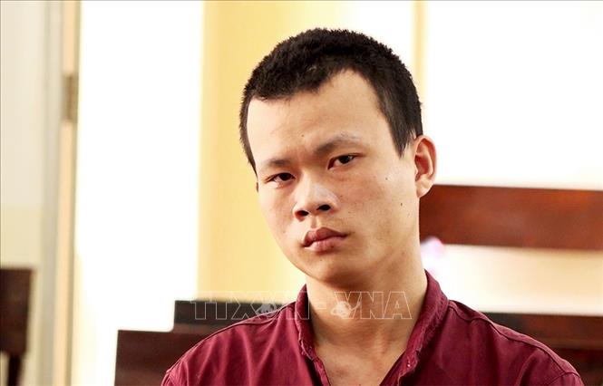 Trong ảnh: Nguyễn Hoài Ân tại phiên toàn sơ thẩm. Ảnh: Công Mạo-TTXVN