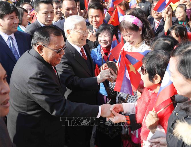 Trong ảnh: Lễ đón Tổng Bí thư, Chủ tịch nước Cộng hòa Dân chủ Nhân dân Lào Bounnhang Vorachith thăm hữu nghị chính thức Việt Nam, sáng 19/12/2017, tại Thủ đô Hà Nội. Ảnh: Phương Hoa - TTXVN