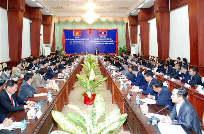 Trong ảnh: Hội nghị Hợp tác An ninh và Phòng chống tội phạm Việt Nam – Lào lần thứ VI tại thủ đô Vientiane, ngày 26/6/2015. Ảnh: Phạm Kiên – TTXVN 