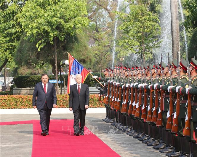 Trong ảnh: Tổng Bí thư, Chủ tịch nước Lào Bounhang Volachith chủ trì Lễ đón và hội đàm với Tổng Bí thư, Chủ tịch nước Nguyễn Phú Trọng thăm hữu nghị chính thức Lào từ ngày 24 - 25/2/2019. Ảnh: Trí Dũng – TTXVN