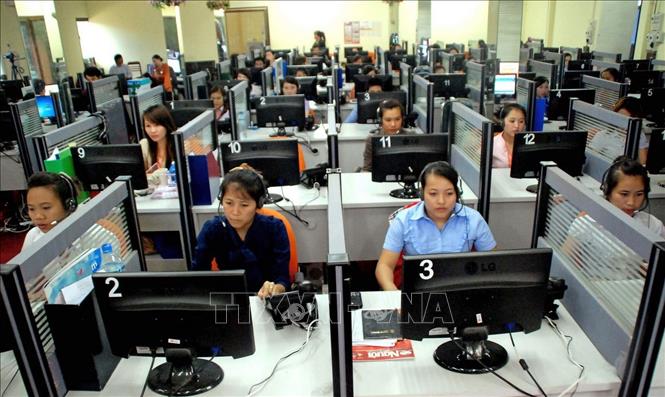 Trong ảnh: Bộ phận tổng đài của Star Telecom (Unitel) - Công ty liên doanh giữa Asia Telecom (Lào) và Tập đoàn Viễn thông Quân đội (Viettel) của Việt Nam. Ảnh: Hoàng Chương - TTXVN