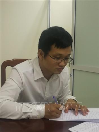 Trong ảnh: Bị can Hoàng Duy Quang (sinh năm 1983, thẩm định viên Công ty TNHH tư vấn đầu tư và thẩm định AMAX). Ảnh: TTXVN phát