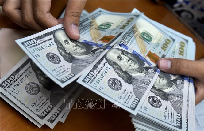 Trong ảnh: Đồng đôla Mỹ. Ảnh: AFP/TTXVN