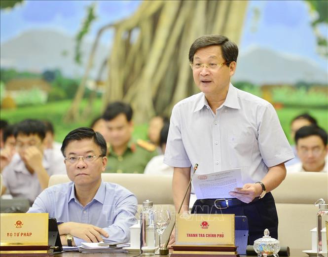 Trong ảnh: Tổng Thanh tra Chính phủ Lê Minh Khái trình bày báo cáo (tóm tắt) về công tác phòng, chống tham nhũng. Ảnh: Trọng Đức - TTXVN
