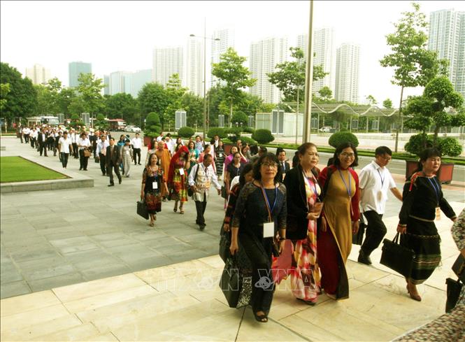 Trong ảnh: Số đại biểu nữ dự Đại hội là 326 người, chiếm hơn 32%. Ảnh: Nguyễn Dân - TTXVN