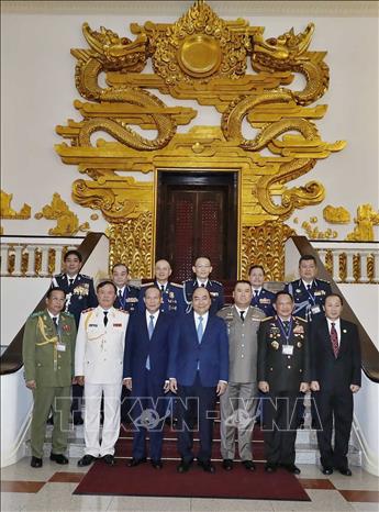 Trong ảnh: Thủ tướng Nguyễn Xuân Phúc và các Trưởng đoàn dự Hội nghị Tư lệnh Cảnh sát ASEAN lần thứ 39. Ảnh: Thống Nhất-TTXVN
