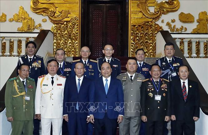 Trong ảnh: Thủ tướng Nguyễn Xuân Phúc và các Trưởng đoàn dự Hội nghị Tư lệnh Cảnh sát ASEAN lần thứ 39 . Ảnh: Thống Nhất-TTXVN