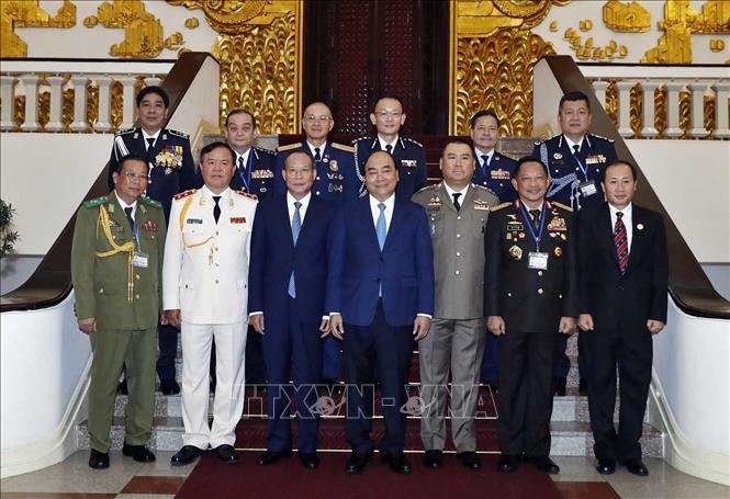 Trong ảnh: Thủ tướng Nguyễn Xuân Phúc và các Trưởng đoàn dự Hội nghị Tư lệnh Cảnh sát ASEAN lần thứ 39. Ảnh: Thống Nhất-TTXVN