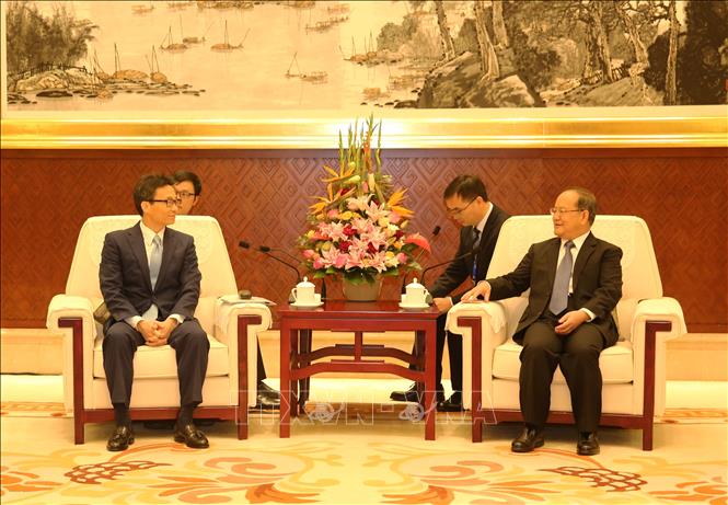 Trong ảnh: Phó Thủ tướng Chính phủ Vũ Đức Đam tiếp Bí thư Khu ủy Quảng Tây Lộc Tâm Xã.  Ảnh: Lương Anh Tuấn-Pv TTXVN tại Trung Quốc