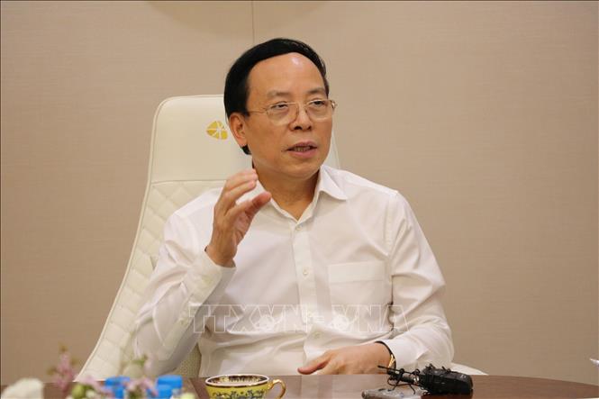 Trong ảnh: Doanh nhân Đỗ Minh Phú, người sáng lập Công ty cổ phần Tập đoàn DOJI, kiêm Chủ tịch HĐQT Ngân hàng Thương mại cổ phần Tiên Phong (TPBank). Ảnh: Nguyễn Thắng - TTXVN 