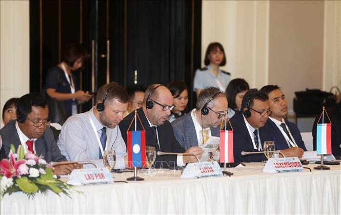 Photo: Delegates at the meeting. VNA Photo: Phạm Hậu