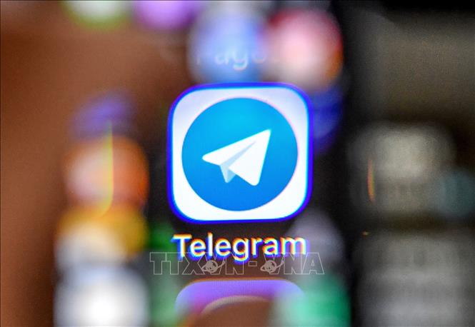 Trong ảnh: Biểu tượng của Telegram trên màn hình điện thoại. Ảnh: AFP/TTXVN