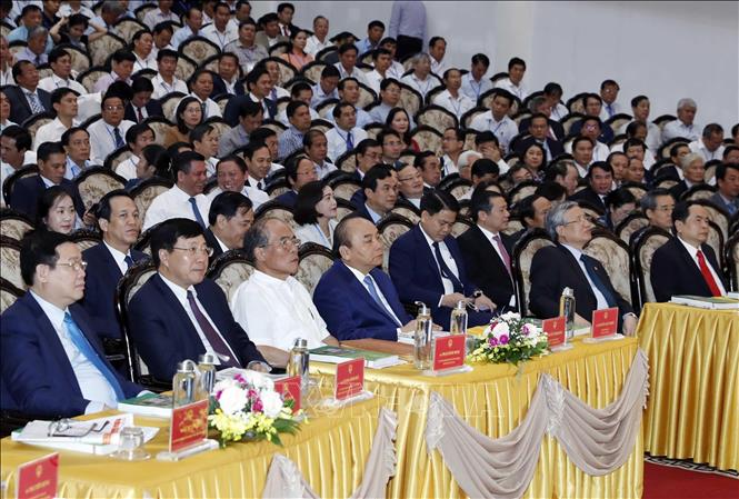 Photo: PM Nguyen Xuan Phuc and other delegates at the conference. VNA Photo: Thống Nhất