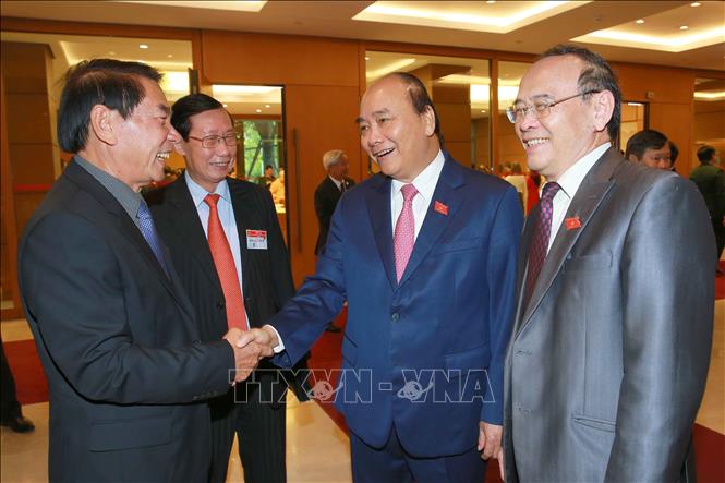 Trong ảnh: Thủ tướng Nguyễn Xuân Phúc với các đại biểu. Ảnh: Doãn Tấn - TTXVN