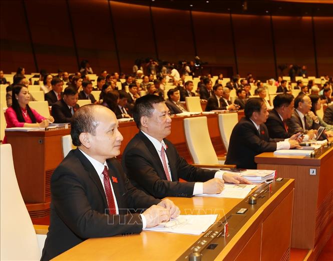 Trong ảnh: Các đại biểu Quốc hội dự khai mạc kỳ họp. Ảnh: Trí Dũng – TTXVN