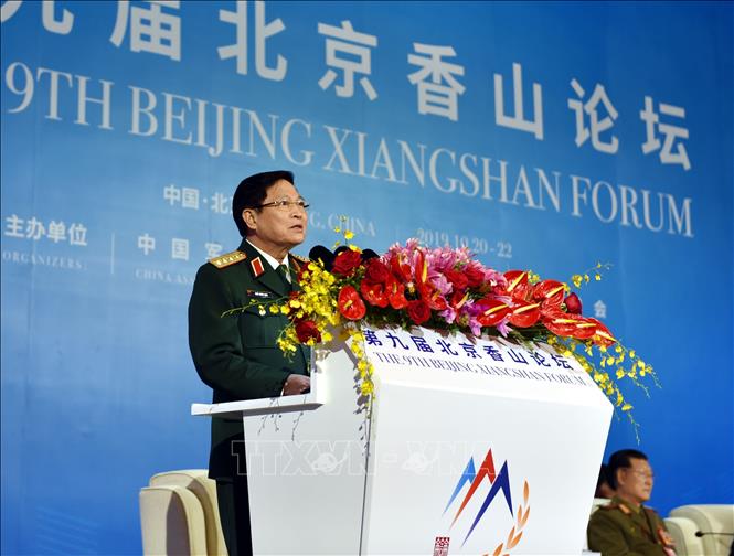 Photo: General Ngo Xuan Lich, Politburo member, Vice Secretary of the Central Military Commission and Minister of National Defence of Vietnam speaks at the forum. VNA Photo: Lương Tuấn