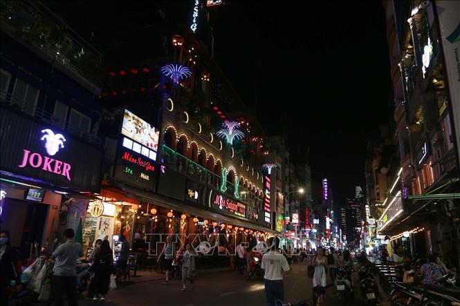 Photo: Bui Vien pedestrian street - one of the city's well-known destinations for street food lovers. VNA Photo: Thanh Vũ