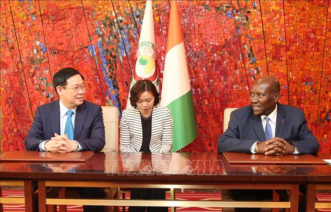 Trong ảnh: Phó Tổng thống Côte d'Ivoire tiếp Phó Thủ tướng Chính phủ Vương Đình Huệ. Ảnh: Phi Hùng-TTXVN 