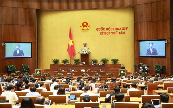 Trong ảnh: Bộ trưởng Bộ Công Thương Trần Tuấn Anh báo cáo trước Quốc hội Ảnh: Doãn Tấn - TTXVN