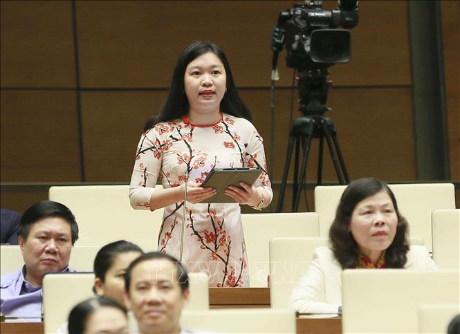 Trong ảnh: Đại biểu Quốc hội tỉnh Lạng Sơn Ngàn Phương Loan chất vấn Bộ trưởng Bộ Công Thương Trần Tuấn Anh. Ảnh: Doãn Tấn - TTXVN