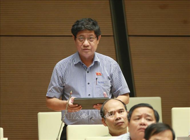 Trong ảnh: Đại biểu Quốc hội tỉnh Bạc Liêu Nguyễn Huy Thái chất vấn Bộ trưởng Bộ Công Thương Trần Tuấn Anh. Ảnh: Doãn Tấn - TTXVN