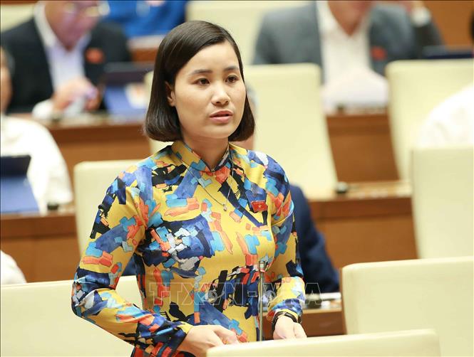 Trong ảnh: Đại biểu Quốc hội tỉnh Bắc Ninh Nguyễn Thị Ngọc Lan chất vấn Bộ trưởng Bộ Công Thương Trần Tuấn Anh. Ảnh: Doãn Tấn - TTXVN