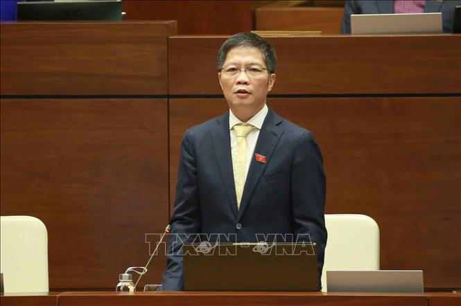 Trong ảnh: Bộ trưởng Bộ Công Thương Trần Tuấn Anh tiếp tục trả lời chất vấn. Ảnh: Doãn Tấn - TTXVN