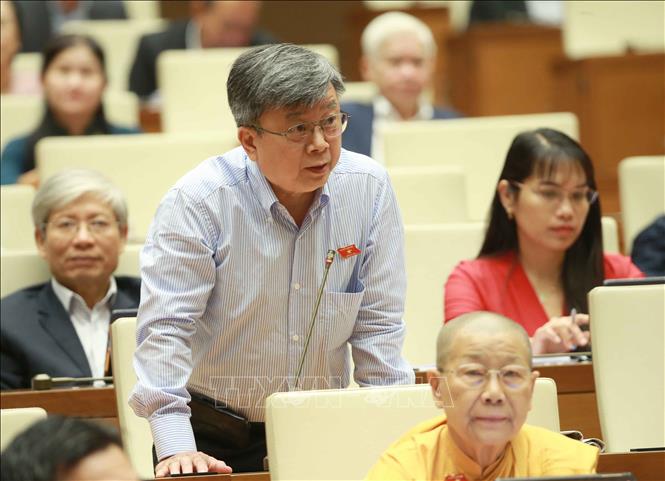 Trong ảnh: Đại biểu Quốc hội TP. Hồ Chí Minh Trương Trọng Nghĩa chất vấn Bộ trưởng Bộ Công Thương Trần Tuấn Anh. Ảnh: Doãn Tấn - TTXVN