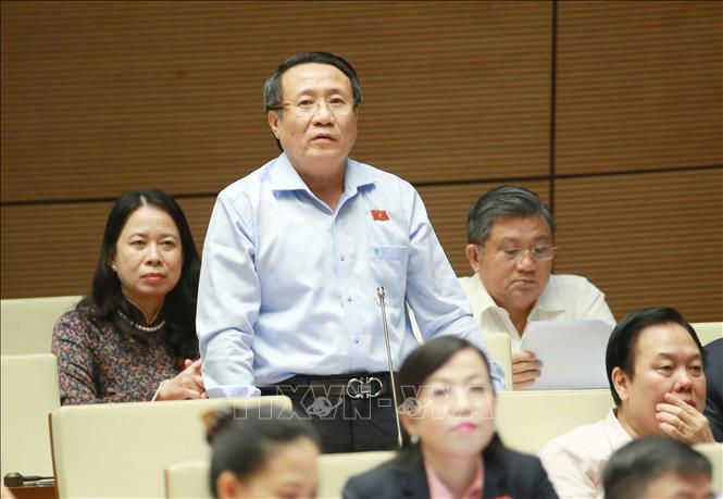 Trong ảnh: Đại biểu Quốc hội tỉnh Quảng Trị Hà Sỹ Đồng chất vấn Bộ trưởng Bộ Công Thương Trần Tuấn Anh. Ảnh: Doãn Tấn - TTXVN