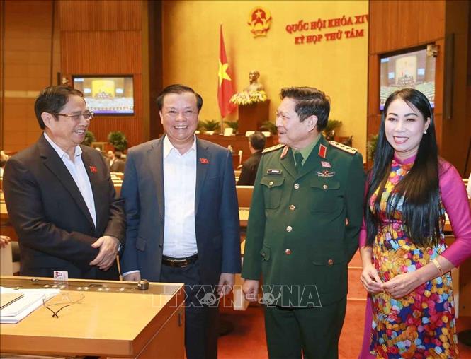 Trong ảnh: Đồng chí Phạm Minh Chính, Ủy viên Bộ Chính trị, Bí thư Trung ương Đảng, Trưởng ban Tổ chức Trung ương và Bộ trưởng Bộ Quốc phòng Ngô Xuân Lịch trao đổi với các đại biểu. Ảnh: Doãn Tấn - TTXVN