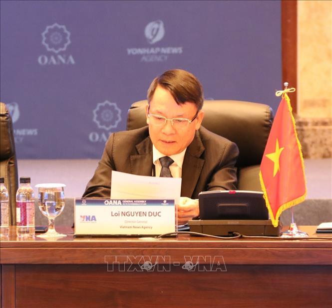 Photo: VNA General Director Nguyen Duc Loi at a session of the 17th OANA General Assembly. VNA Photo: Mạnh Hùng